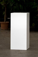 Variations of cachepots: Piece of white furniture